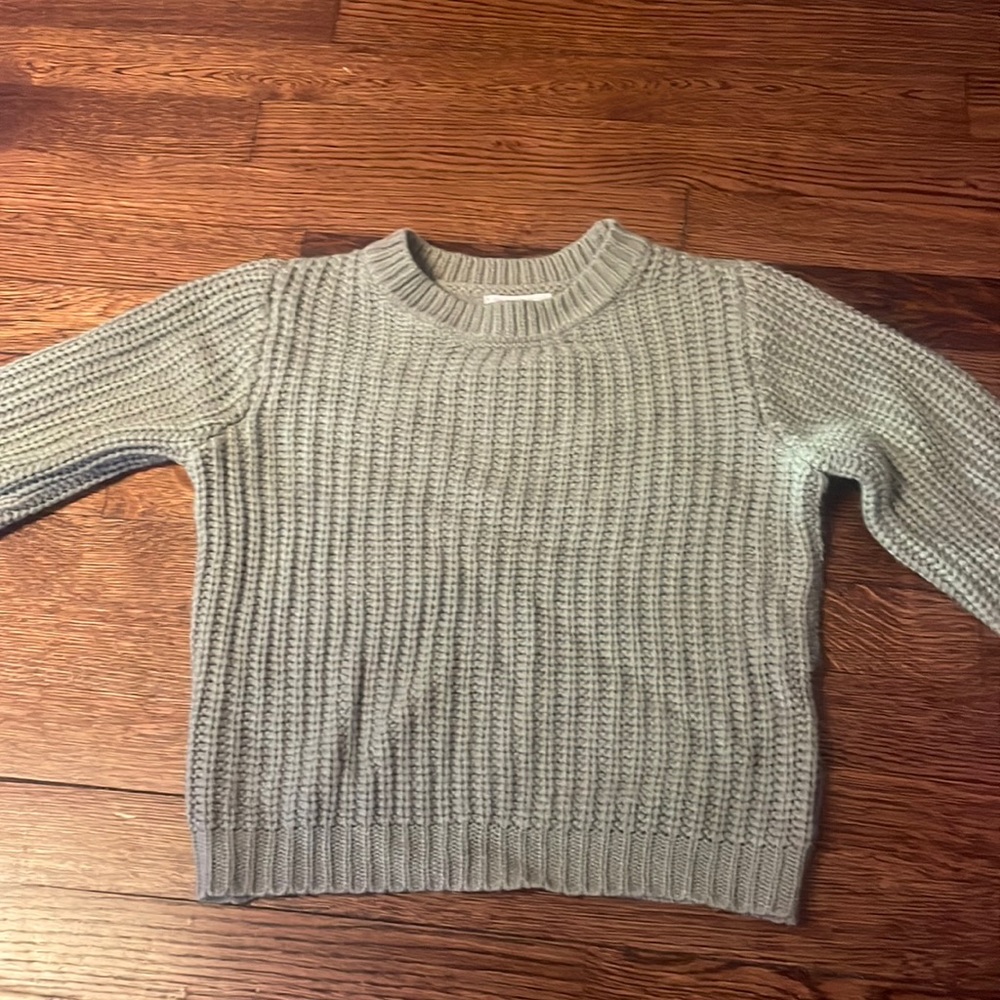 green sweater